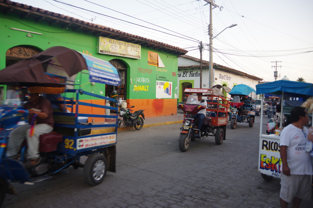 Motocarros - a local type of public transport, with a concept similar to a Tuk-Tuk but apparently following fixed routes